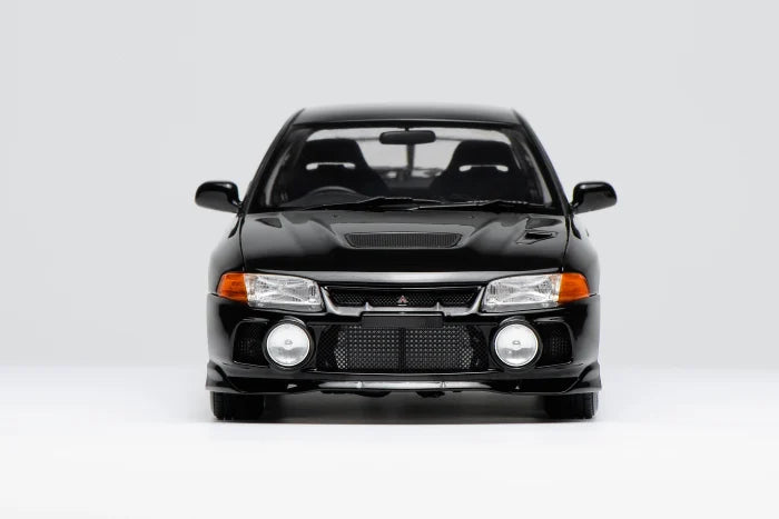 1:18 Motorhelix Mitsubishi Lancer Evo IV Pyreness Black M-84002