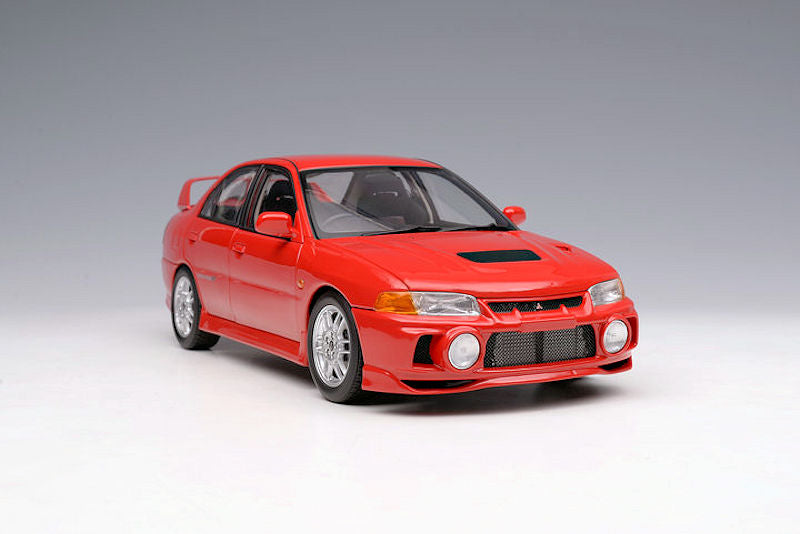 1:18 Motorhelix Mitsubishi Lancer Evo IV Rot M-84004