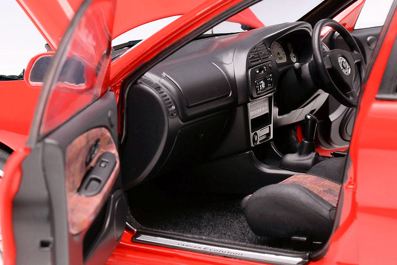 1:18 Motorhelix Mitsubishi Lancer Evo IV Rot M-84004
